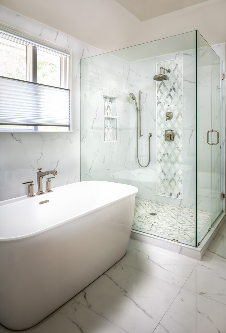 An amazing soaking tub and large walk-in shower highlight this master bathroom.